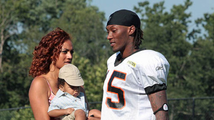 In this Aug. 2009 photo, Cincinnati Bengals receiver and former West Virginia University star Chris Henry is pictured at Bengals training camp at Georgetown College in Georgetown, Ky. with his girlfriend Loleini Tonga and their three children.