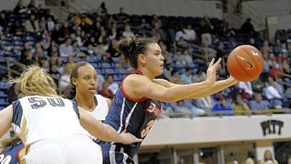 Duquesne's Diana Voynova emerges from the pack with the ball yesterday in the Dukes' upset of No. 20 Pitt at the Petersen Events Center. Voynova had 10 points and 10 rebounds.