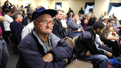 Charles Lytle, 79, of East Pittsburgh, who has been treated at UPMC Braddock, listens after asking a question concerning the hospital's planned closing during a community meeting last night.