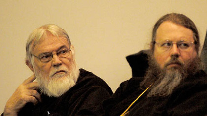 From left, His Eminence Archbishop Nathaniel, Archbishop of the Romanian Orthodox Episcopate of America, and The Most Blessed Jonah, Metropolitan of All America and Canada, listen to the discussion on the "New Face of American Orthodox Christianity in the 21st Century," at the Orthodox Christianity in North America conference at the Antiochian Village Retreat Center in Lionier.