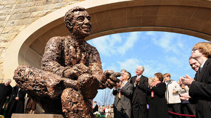 Family and friends applaud after the unveiling of the Fred Rogers statue on Pittsburgh's North Shore.