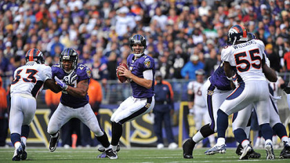 Quarterback Joe Flacco led the Ravens to a 30-7 home win against the Broncos yesterday.