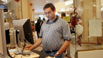 George Spiridonakos, who stopped yesterday at  CMU's Research Cafe on the food court level of Fifth Avenue Place, answers questions about texting.