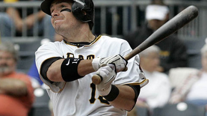 Pirates third baseman Andy LaRoche follows through on a two-run home run off Dodgers pitcher James McDonald during the eighth inning.