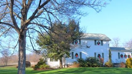 The Westmoreland County farm in the "Rural Politics" painting as it appears today.