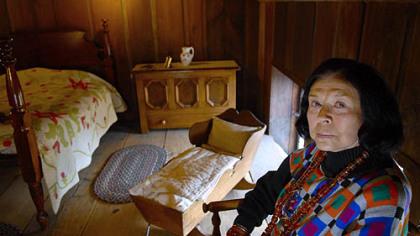 E. Maxine Bruhns sits in the loft of the Early American Room in the Cathedral of Learning, said to be haunted by her grandmother, Martha Jane Poe.