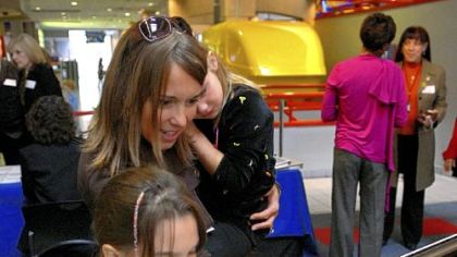 Alina, 7, plays with a video scope with her mother, Juli Milan, of the South Side, and sister, Kendall, 5, at a new exhibit called, "If a Starfish Can Grow a New Arm, Why Can't I?", which was unveiled yesterday by the Carnegie Science Center and the Pittsburgh Tissue Engineering Initiative.