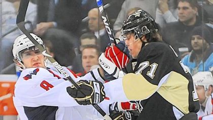 Evgeni Malkin collides with the Capitals Alex Ovechkin in a game at Mellon Arena last season.