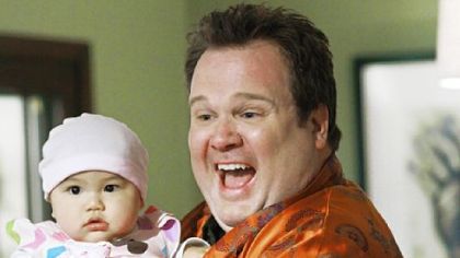 In "Modern Family," Eric Stonestreet portrays Cameron, half of a gay couple who have adopted a baby from Vietnam.