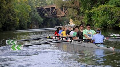 The Taylor Allderdice novice team paddles along the back channel of the Allegheny River at Washington's Landing during a practice for the Head of the Ohio Regatta on Oct. 3.