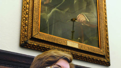 Under the gaze of Andrew Carnegie at the Oakland library yesterday, library director Barbara Mistick talks of plans to close five branches.