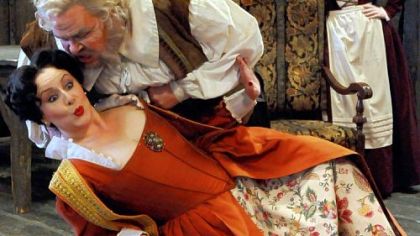 Mark Delavan as Falstaff, Veronica Villarroel, left, as Alice Ford, and Lindsay Ammann as Mistress Quickley in Pittsburgh Opera's production of "Falstaff."