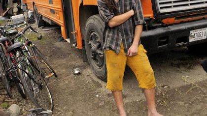 Ben Fox, of the volunteer group Everybody's Kitchen, stands by the group's bus under the Bloomfield Bridge, ready to cook and hand out free meals, before police ordered the group to move on Monday.