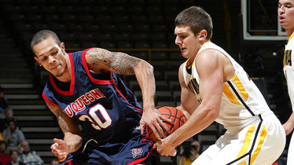 Duquesne guard Bill Clark on the Dukes' defense: "We have been a tougher team."