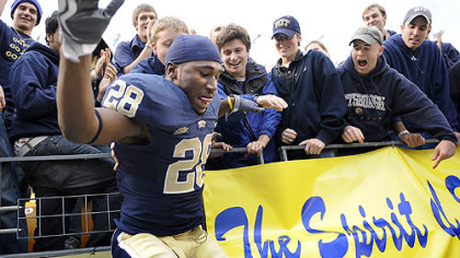 Dion Lewis jumps down from the student section after his team defeated South Florida, 41-14, at Heinz Field Saturday.