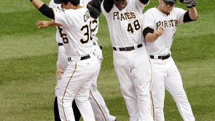 Pirates players celebrate an 11-1 win against the Dodgers.