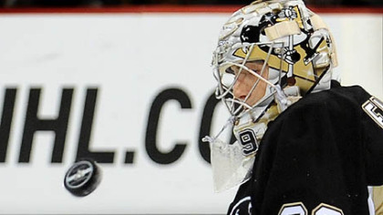 Goalie Marc-Andre Fleury makes save against the Thrashers in last night's 3-1 Penguins victory at Mellon Arena.