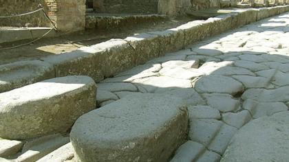 The raised stones in Pompeii are just high enough to allow pedestrians to cross water-filled streets but low enough to allow chariots to lumber past without any problems.