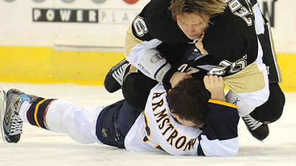 Ruslan Fedotenko gets the drop on Atlanta's Colby Armstrong early in the game last night at Mellon Arena.