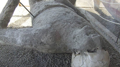 The Macellum of Pompeii, or main market for meat and fish, dates from the 2nd century BC and originally included a porticoed courtyard with various shops. Today, the main attraction is the cast of a man's body found inside.